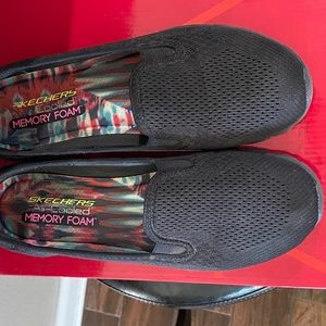 Black Sketchers Slip Ons